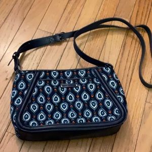 Vera Bradley small shoulder bag with faux leather strap.
